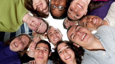A diverse group of young adults on a white background